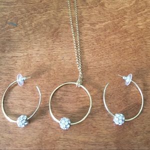 Gold and crystal necklace and earring set
